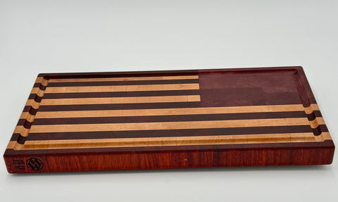 Angled view of American flag end-grain cutting board handmade in San Diego by Mostad Works