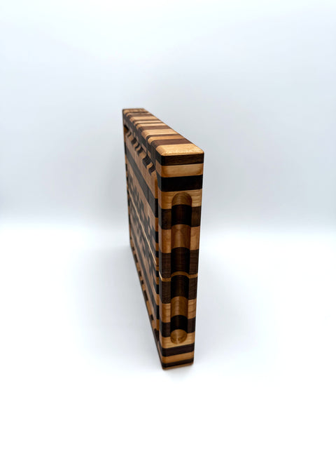 Side view of chaos end-grain cutting board showing thickness handmade in San Diego
