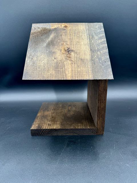 Base detail of handcrafted hardwood bedside book holder San Diego