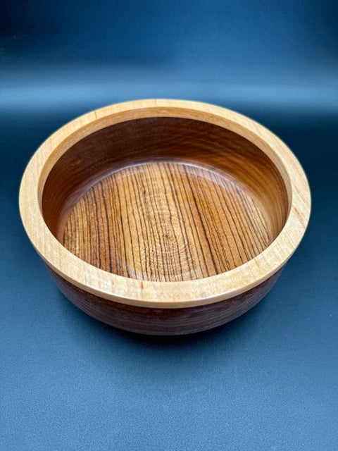 Hand-turned purpleheart wood bowl side view made in San Diego