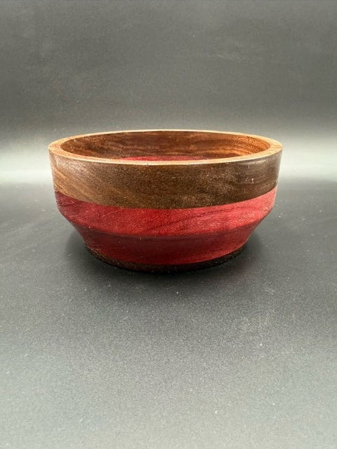 Front view of red and walnut turned wood bowl handcrafted in San Diego by Mostad Works