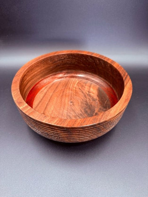 Small red hardwood turned bowl handcrafted in San Diego by Mostad Works