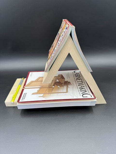 Maple bedside book holder displaying open book handmade in San Diego