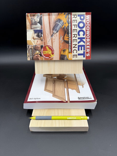 Wood bedside book holder with stacked books handcrafted in San Diego