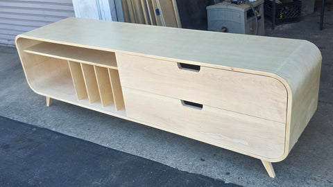 Angled view of custom mid-century modern TV console handmade in San Diego
