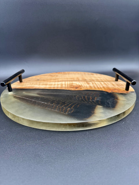 Side view of round hardwood epoxy tray with black handles made in San Diego