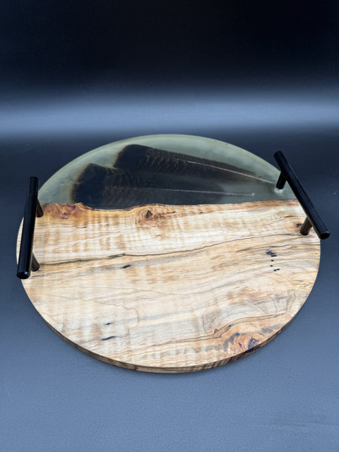 Round wood and epoxy serving tray with black handles handcrafted in San Diego