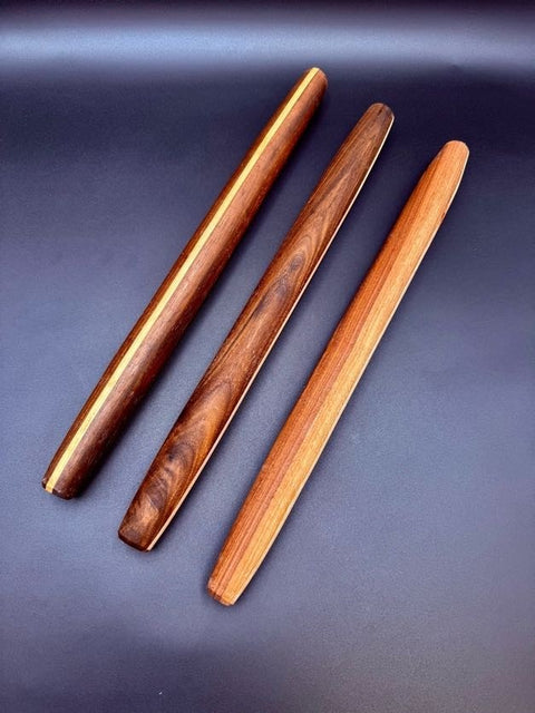 Three French rolling pins in different hardwoods handmade in San Diego