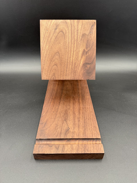 Front view of walnut bedside book holder made in San Diego by Mostad Works