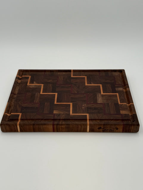 Angled view of staircase pattern end-grain cutting board handmade in San Diego