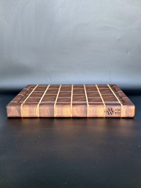 Front view of walnut maple brick pattern cutting board veteran-made in San Diego