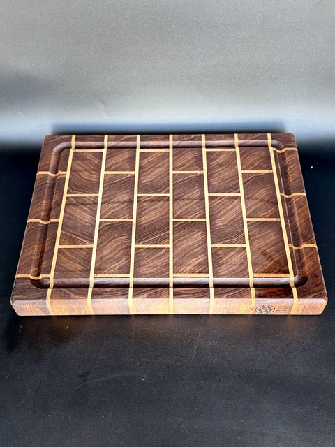 Walnut and maple brick pattern end-grain cutting board handcrafted in San Diego