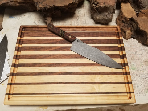 Walnut and maple gradient cutting board with knife handcrafted in San Diego by Mostad Works
