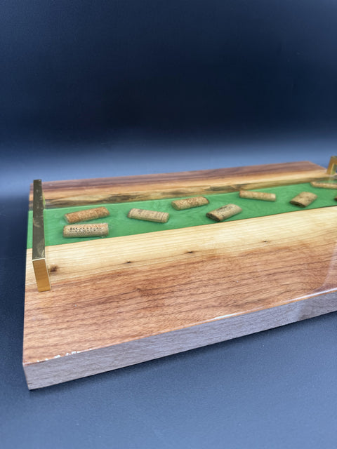 Side view of handcrafted epoxy serving tray with wine cork inlay made in San Diego