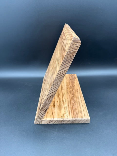 Angled side view of Zebrawood magnetic knife holder made in San Diego