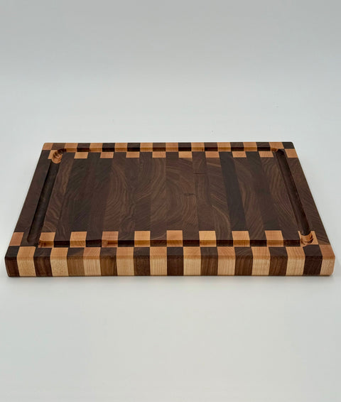 Walnut and maple zipper pattern end-grain cutting board handcrafted in San Diego