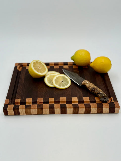 Zipper pattern cutting board with lemons and knife handcrafted in San Diego
